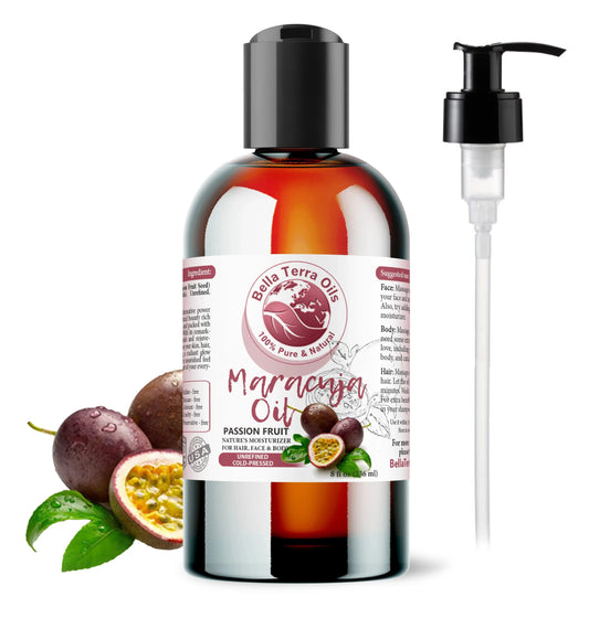 A bottle of Bella Terra Oils Maracuja Oil with a pump dispenser, accompanied by fresh passion fruits and leaves.