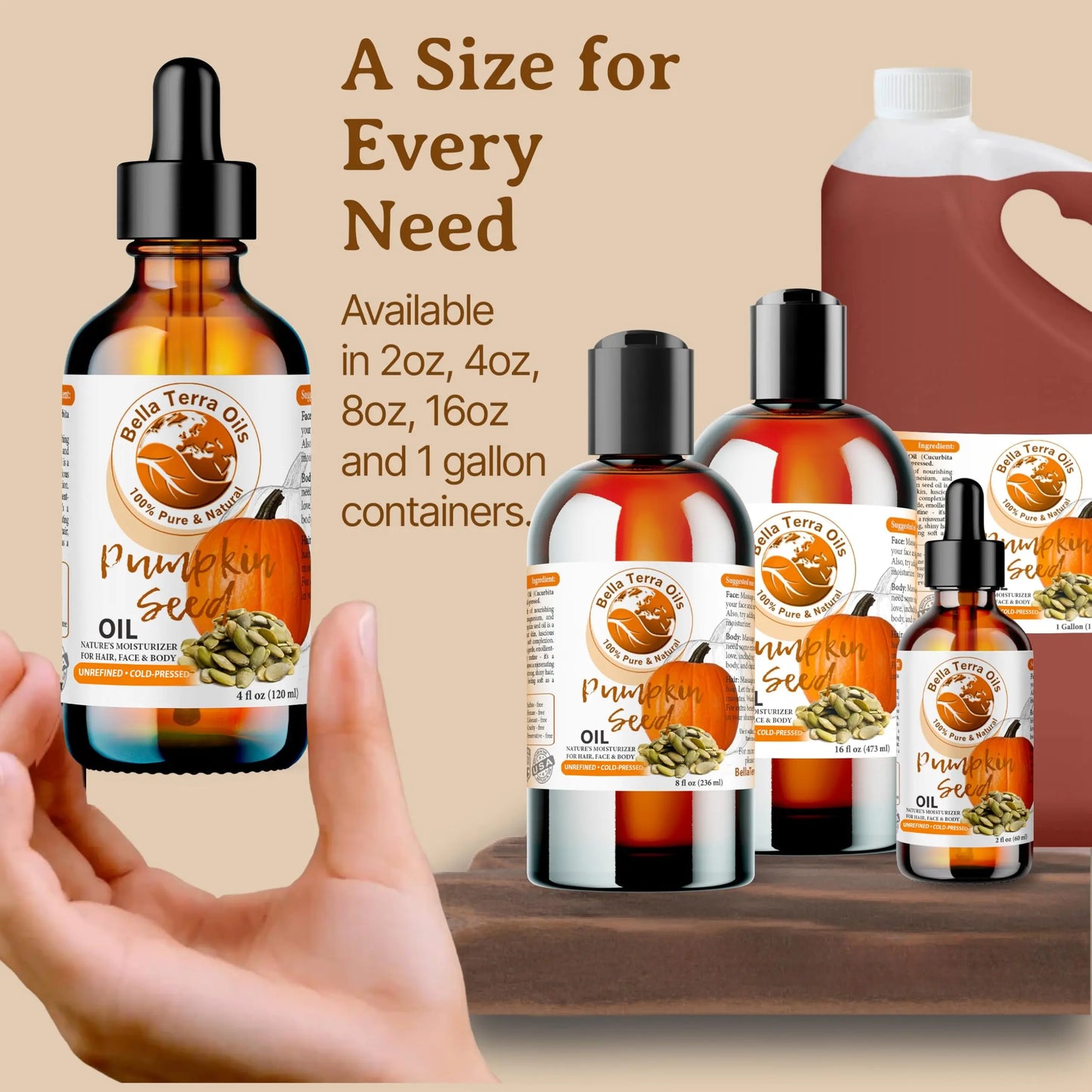 Balla Terra Pumpkin Seed Oil bottles in various sizes with a hand holding one bottle.
